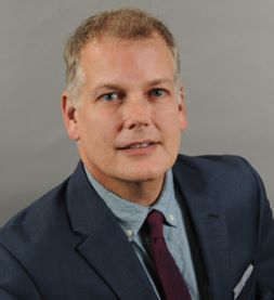 Headshot of Robert Pomales, Executive Director of UHS.