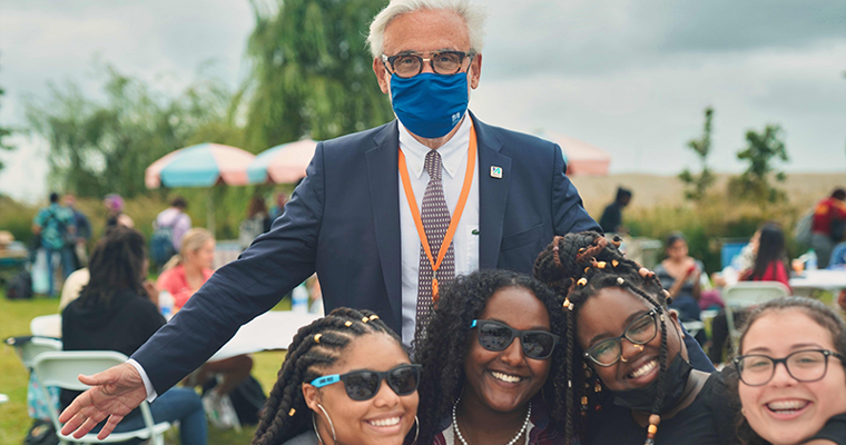 Chancellor meets students during the campus barbeque.